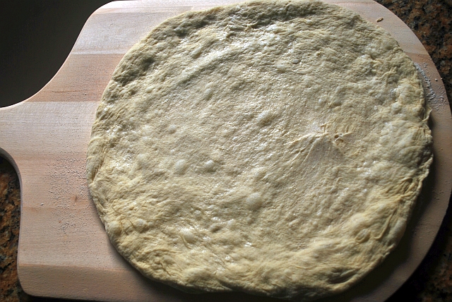 stretched pizza dough